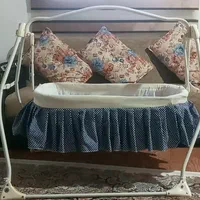 گهواره نوزاد به هم راه چشه بندش