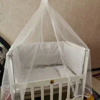 تخت گهواره ای کنار تخت مادر