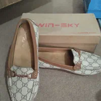 کفش آکبند و نوو|کیف، کفش، کمربند|مهاجران, |دیوار