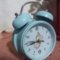 ساعت رو میزی زنگ خور و چراغ دار