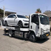 یدک کش چرخگیر خودروبر خودروسوار نیسان یدک کش کفی