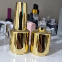 شیشه لاک  کروم شده ۱۵ میل طلایی و نقره ای