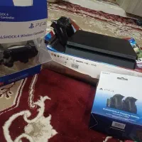 یک ترا اسلیم کپی خور ps4 با دوتا دسته و پایه شارژ