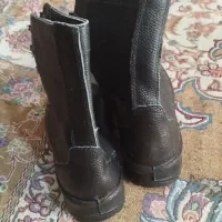 پوتین|کیف، کفش، کمربند|پیشوا, |دیوار