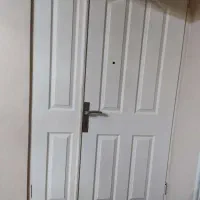 درب ورودی آپارتمان به همراه چارچوب و گارد آهنی