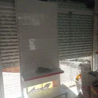 قفسه ایستاده یا استند وسط مغازه ای|فروشگاه و مغازه|گلبهار, شهر جدید گلبهار|دیوار