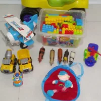 چهار چرخ و تعدادی اسباب بازی