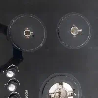 فروش گاز صفحه‌ای شیشه‌ای پودنیس ۵ شعله  در حد نو