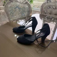 پاشنه بلند|کیف، کفش، کمربند|رشت, امین الضرب|دیوار