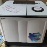 لباس شویی دو قلو