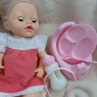 عروسک با وسایل