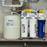 تعمیر و تعویض فیلتر دستگاه تصفیه آب خانگی