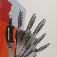 سرویس کارد وساطور ۸ پارچه همراه با استندآکبند .