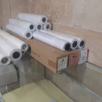 تعدادی رول پلاتر،رول کاغذ کوتد فتوگلاسه و فوم برد