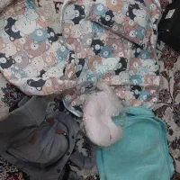 لباس نوزادکاپشن اسباب بازی تشک بازی پتوی نوزاد