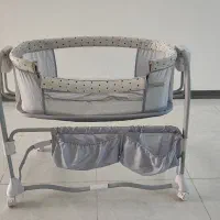گهواره برقی و تخت کنار مادر ماستلا|تخت و صندلی بچه|شیراز, شهرک والفجر|دیوار