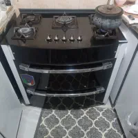 لوازم خانگی گاز قاب عکس میز تلویزیون ساعت
