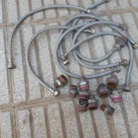 ساعت .شلنگ .شلنگ اب .لامپ.