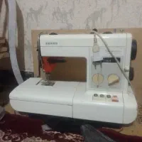 چرخ خیاطی دکمه ای.