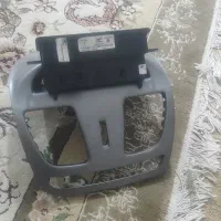 قاب روی داشبورد کوییک و ساعت دیجیتال