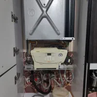 نصب تعمیر سرویس پکیج آبگرمکن برد کولر برقی گازی