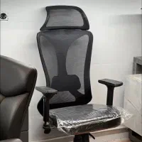 صندلی اداری چرخدار پشت توری مش‌