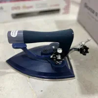 اطو بخار صنعتی (سرمی ) متصل به دستگاه بخار