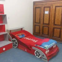 تخت خواب و‌ کمد