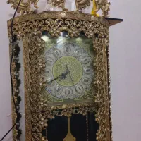 ساعت ایستاده برنجی جاکلیدی و دوتا طاووس ۱۰تومن