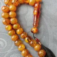 جواهر زیبای کهربا کارکرده نخ نما