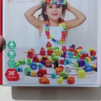 اسباب بازی چوبی نخ و مهره