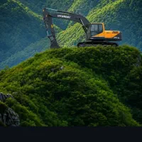 راننده بیل مکانیکی هستم