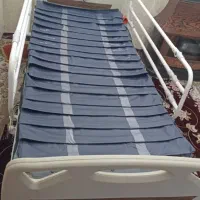 تخت خواب بیمار سه شکنه ، تشک مواج ، میز غذا بیمار