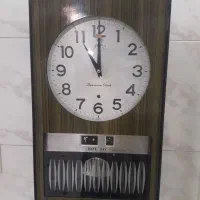 ساعت دیواری قدیمی چوبی