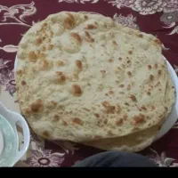 نان تنوری گرم و تازه۵ تومان ساده ۷ تومان کنجدی