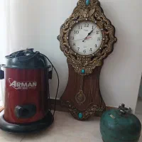 ساعت دیواری . جارو برقی . پیت نیک