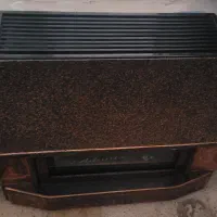 بخاری شومینه آدونیس کم کارکرده شیک و زیبا