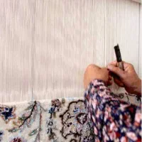 کار در کارگاه قالی بافی