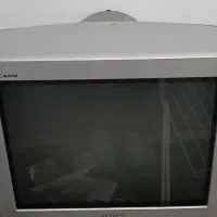 تلوزیون همراه با میز تلوزیون چوبی