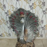 مجسمه و سبد گل