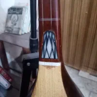 دوتار کرمانج|سازهای سنتی|نیشابور, گنبد سبز|دیوار