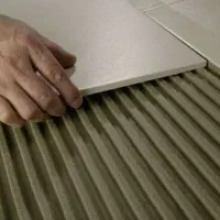 چسب کاشی پرسلانی پودری  ۲۰ کیلویی درجه ۱