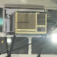 کولر گازی ۱۸۰۰۰ پشت پنجره او جنرال
