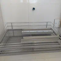 نظم دهنده داخل کابینت.  جا قابلمه و جا سیب و پیاز