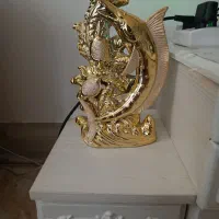 گلدان و مجسمه طلایی