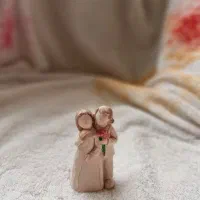 مجمسه تزیینی و عروسک فنری ماشین