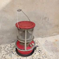 یک عدد چراغ نفتی وچهار عدد قالپاق پژو