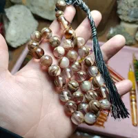 تسبیح کهربا رگه پیچ سفید دودی