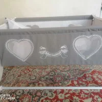 گهواره کودک و روروک