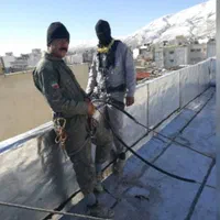 کار در ارتفاع .شستشوی نما .پیچ رولپلاک